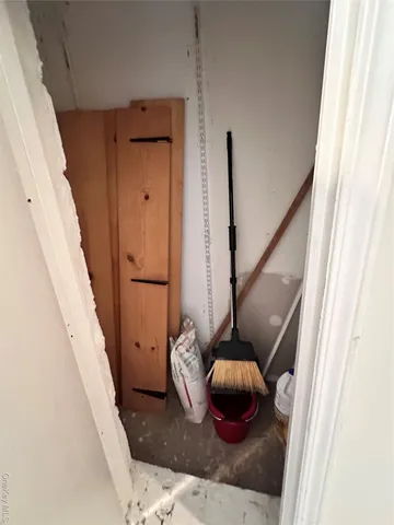 a large kitchen with a stove a sink and a refrigerator