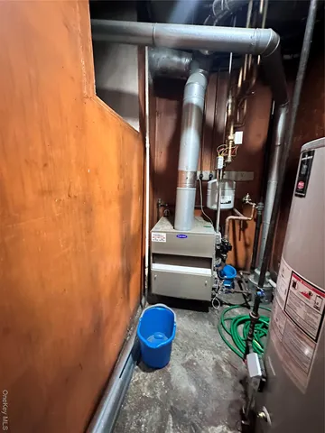 an empty room with white walls and tiles