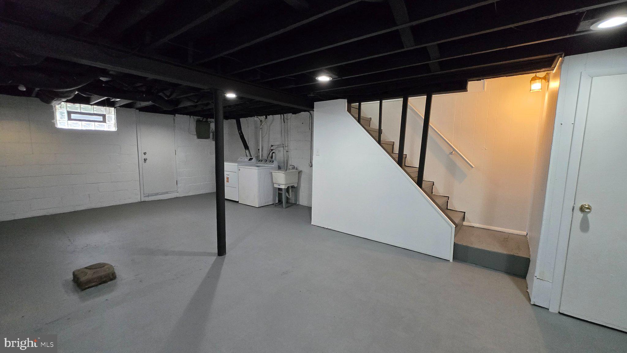 3820 Elkader Road Baltimore, MD 21218 - Photo 38 of 41 Spacious, versatile basement retreat.