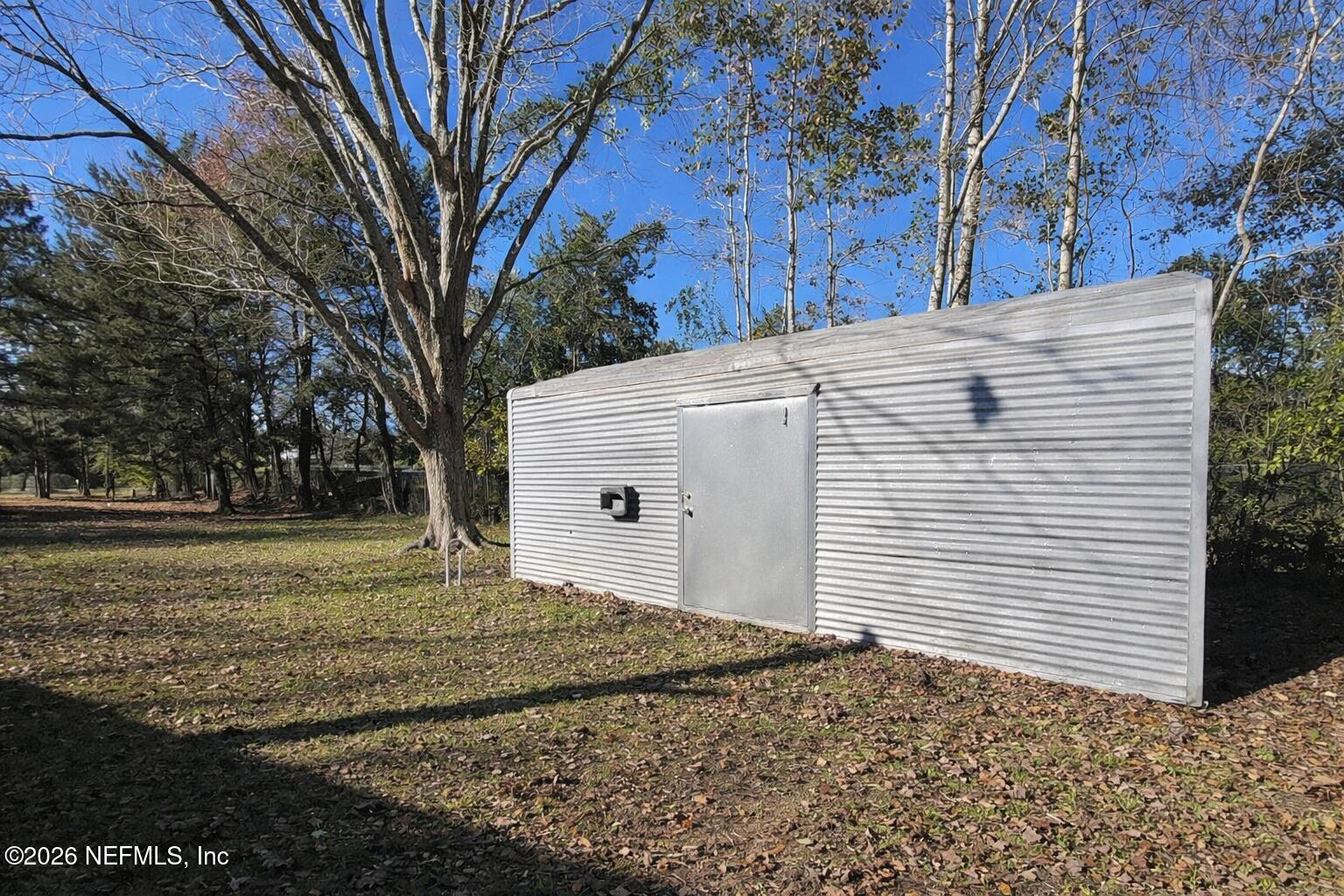 54052 Dornbush Road Callahan, FL 32011 - Photo 20 of 27 a view of a backyard