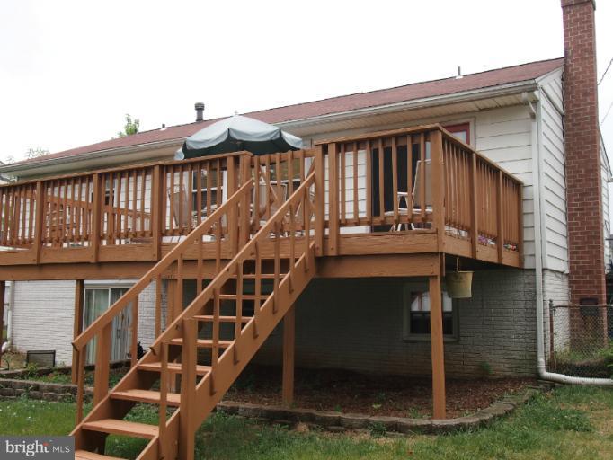 319 Holly Manor Road Baltimore, MD 21228 - Photo 17 of 17 a view of house with a balcony
