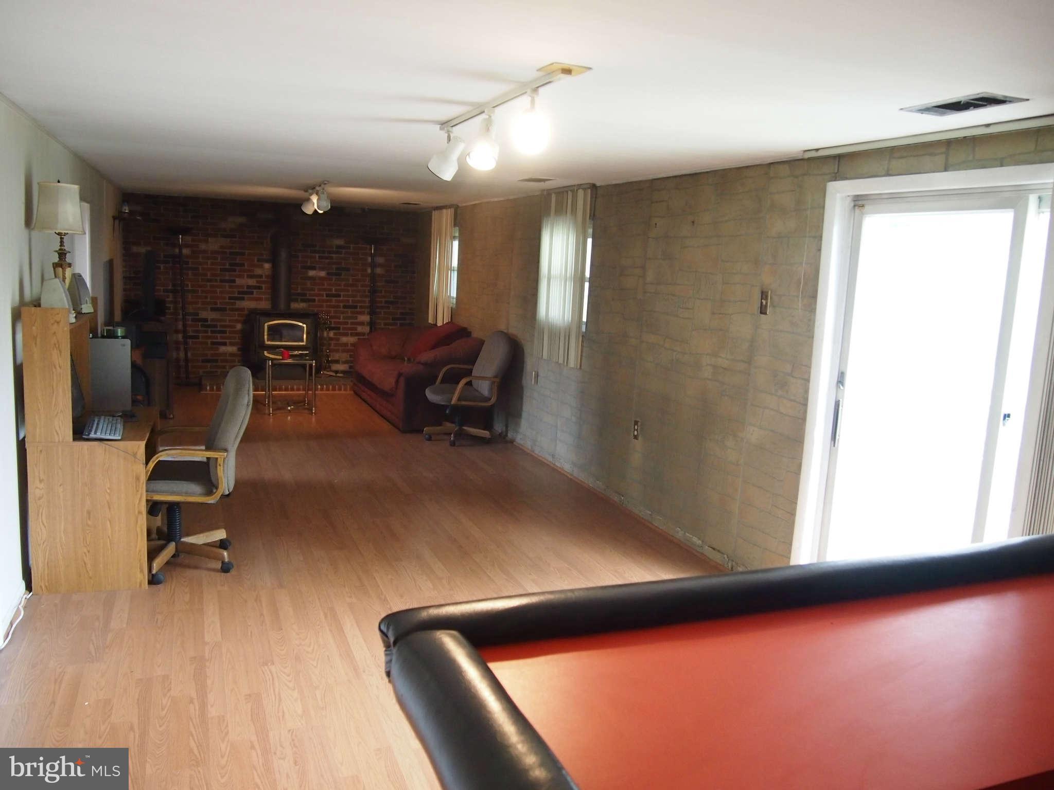 319 Holly Manor Road Baltimore, MD 21228 - Photo 8 of 17 a view of a room with gym equipment