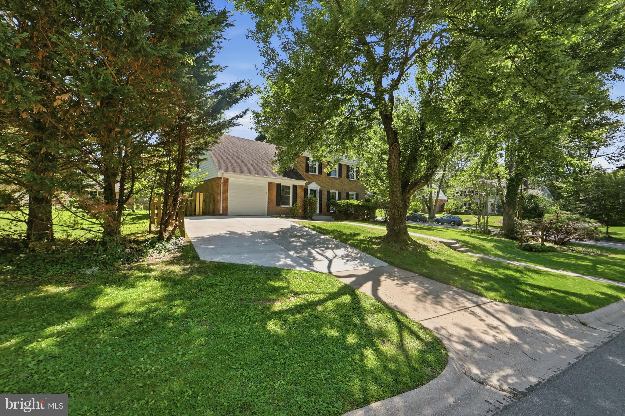 8008 Inspection House Road Potomac, MD 20854 - Photo 3 of 43 Charming home nestled among trees.