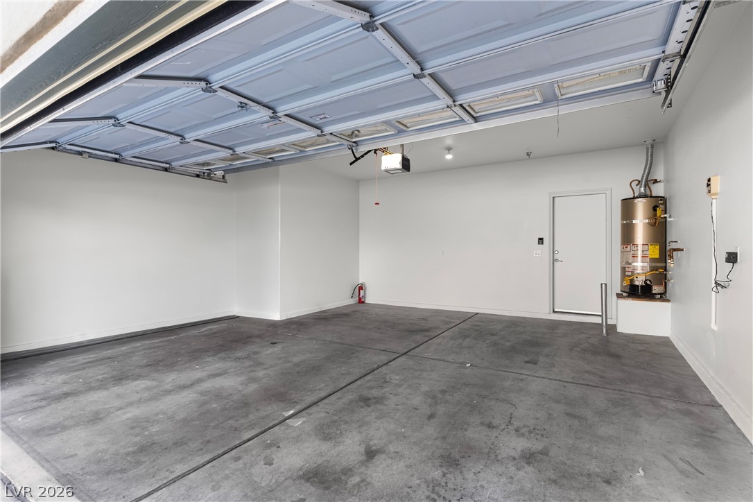 181 Short Ruff Way Las Vegas, NV 89148 - Photo 23 of 43 Garage with secured water heater