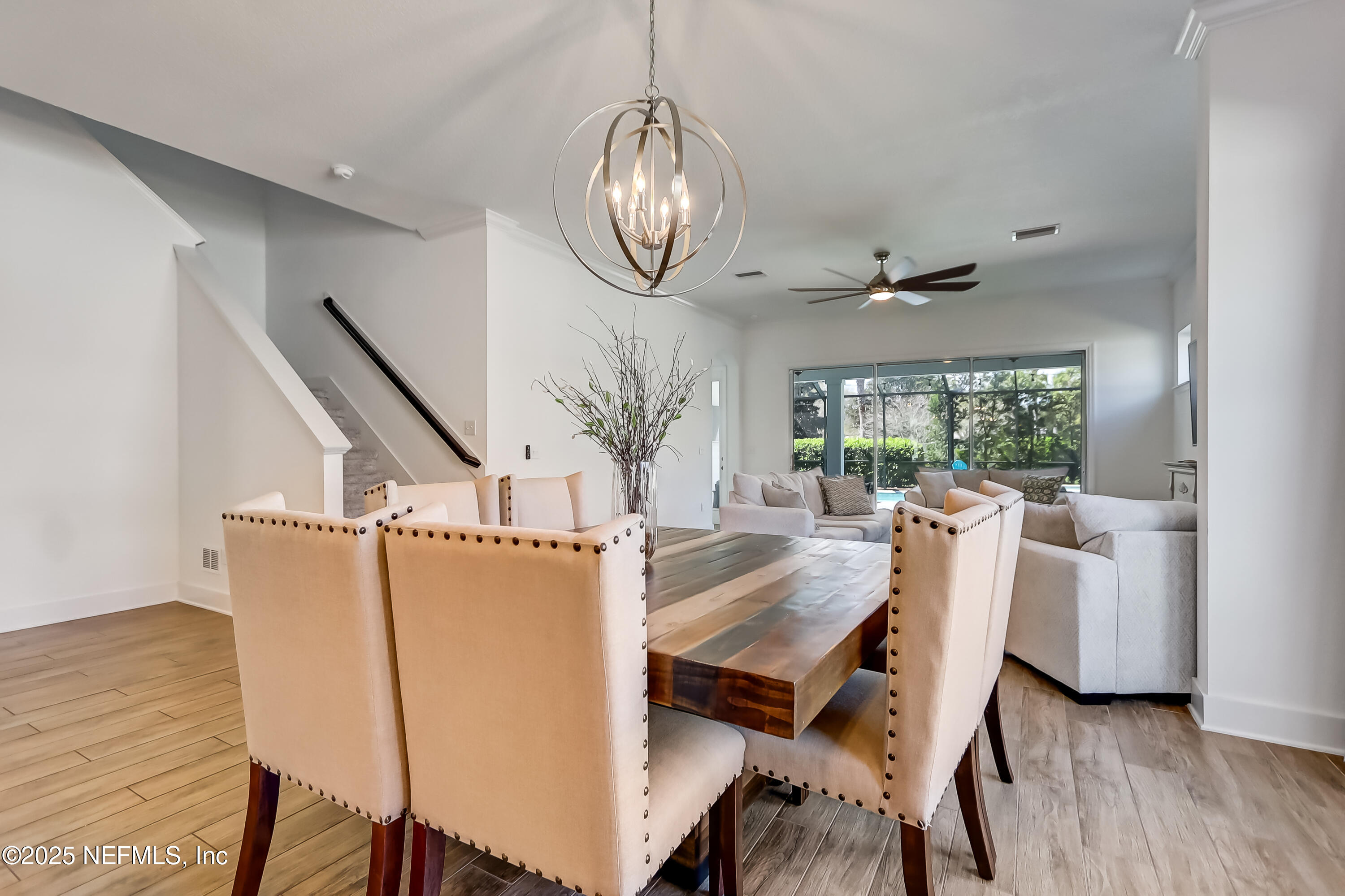 385 Daniel Park Circle Ponte Vedra, FL 32081 - Photo 20 of 34 a view of a dining room with furniture window and wooden floor