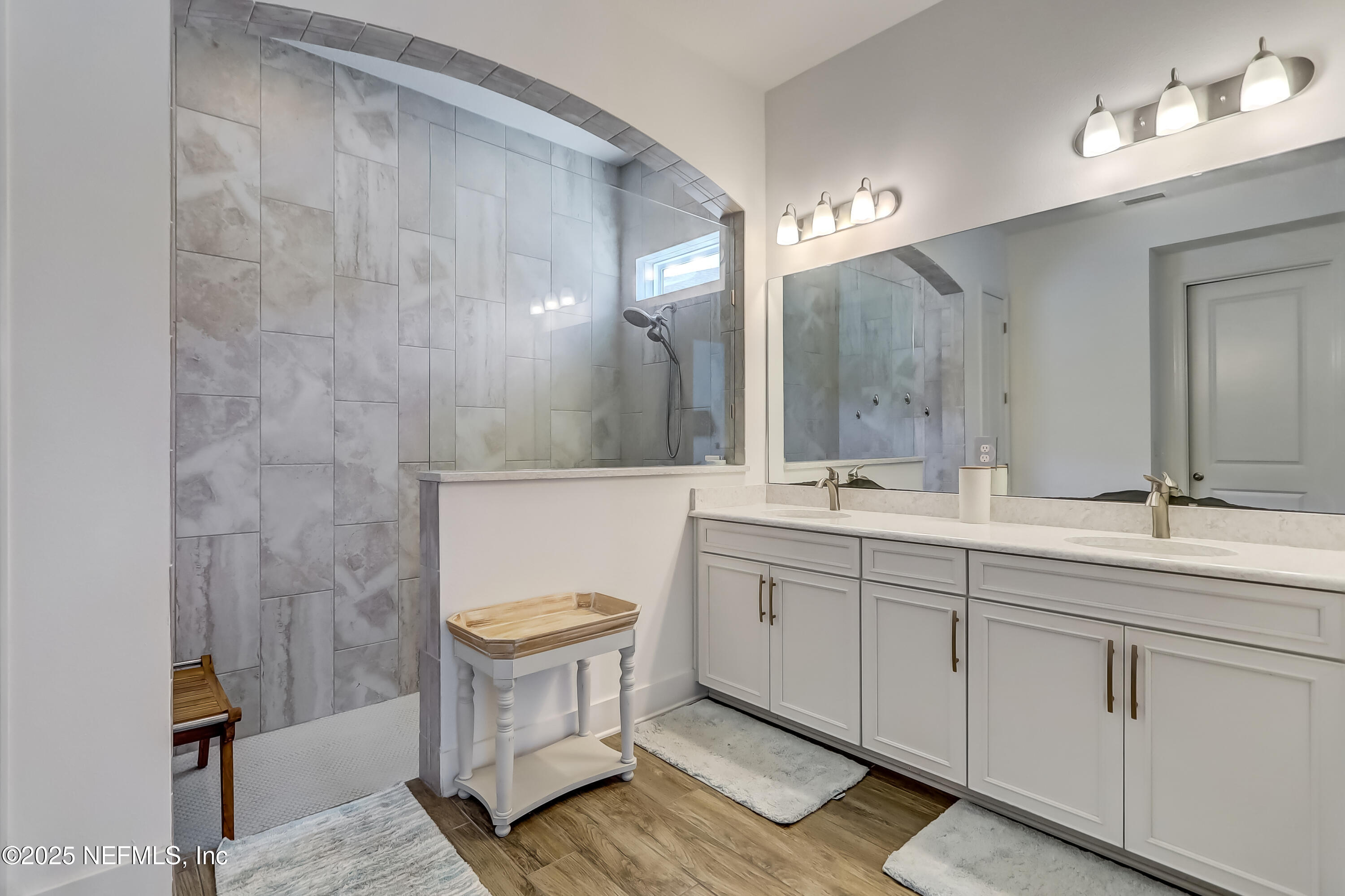 385 Daniel Park Circle Ponte Vedra, FL 32081 - Photo 23 of 34 a bathroom with a sink a toilet and mirror