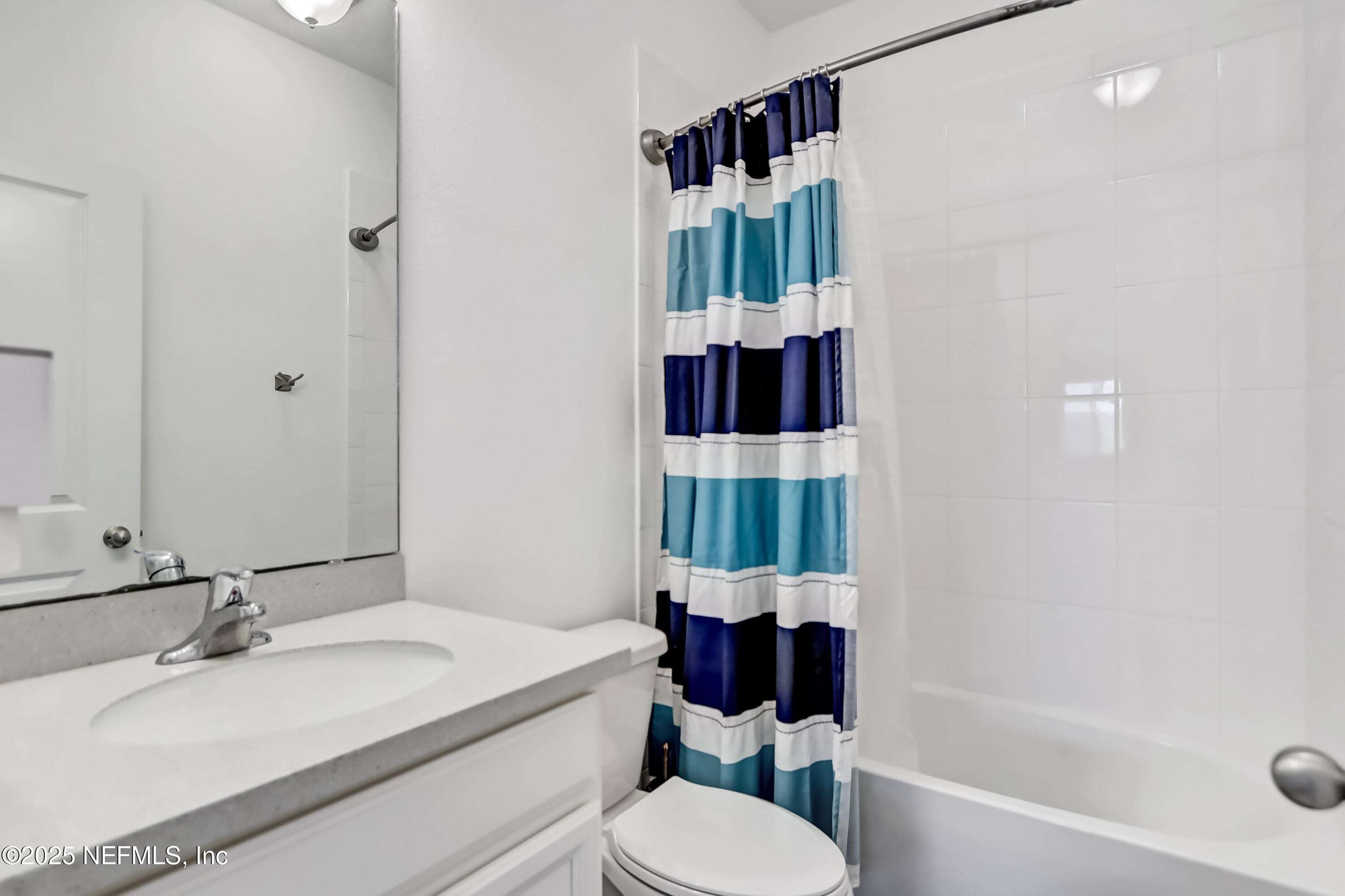 385 Daniel Park Circle Ponte Vedra, FL 32081 - Photo 24 of 34 a bathroom with a sink toilet and shower