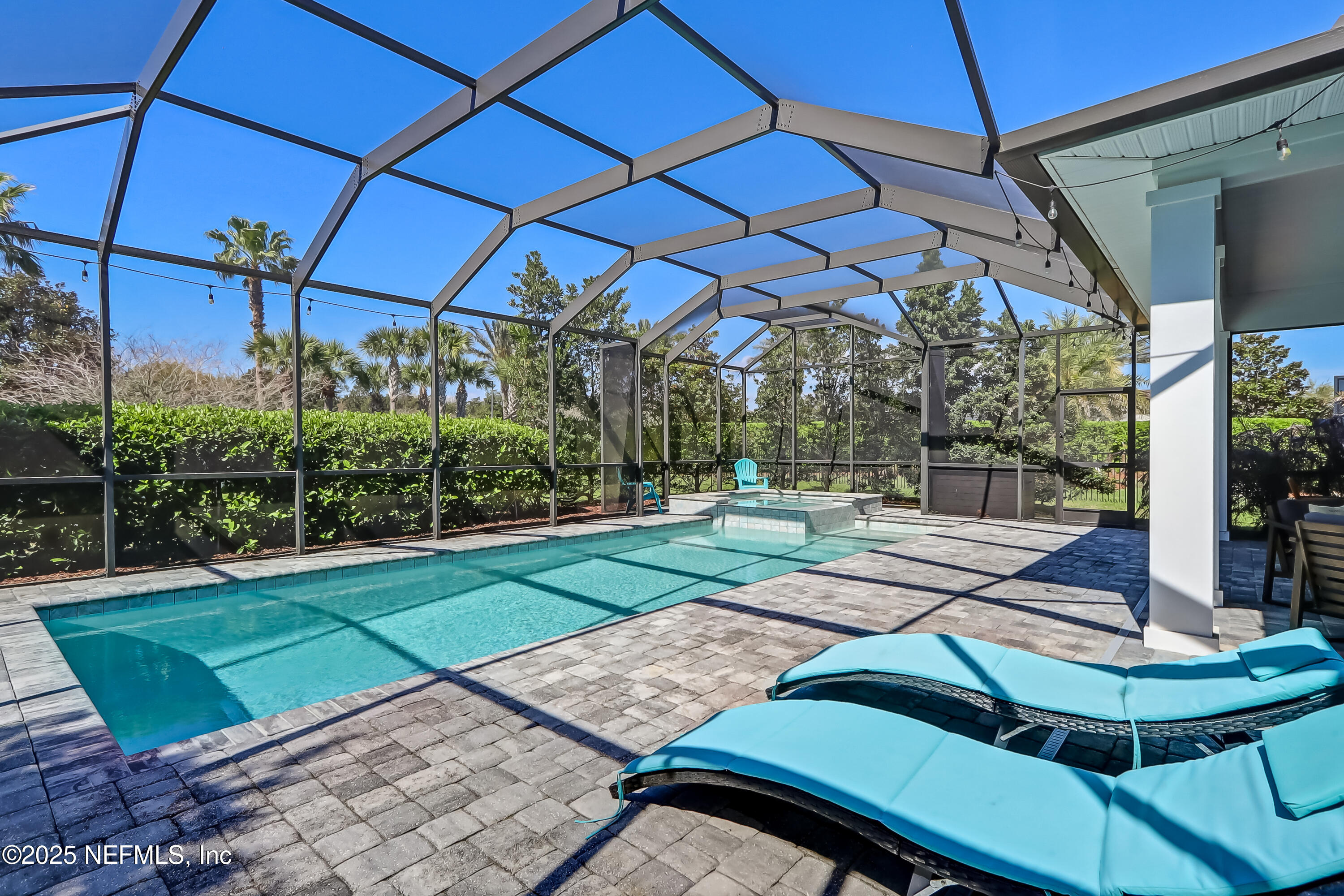 385 Daniel Park Circle Ponte Vedra, FL 32081 - Photo 31 of 34 a view of a chairs and table in the patio