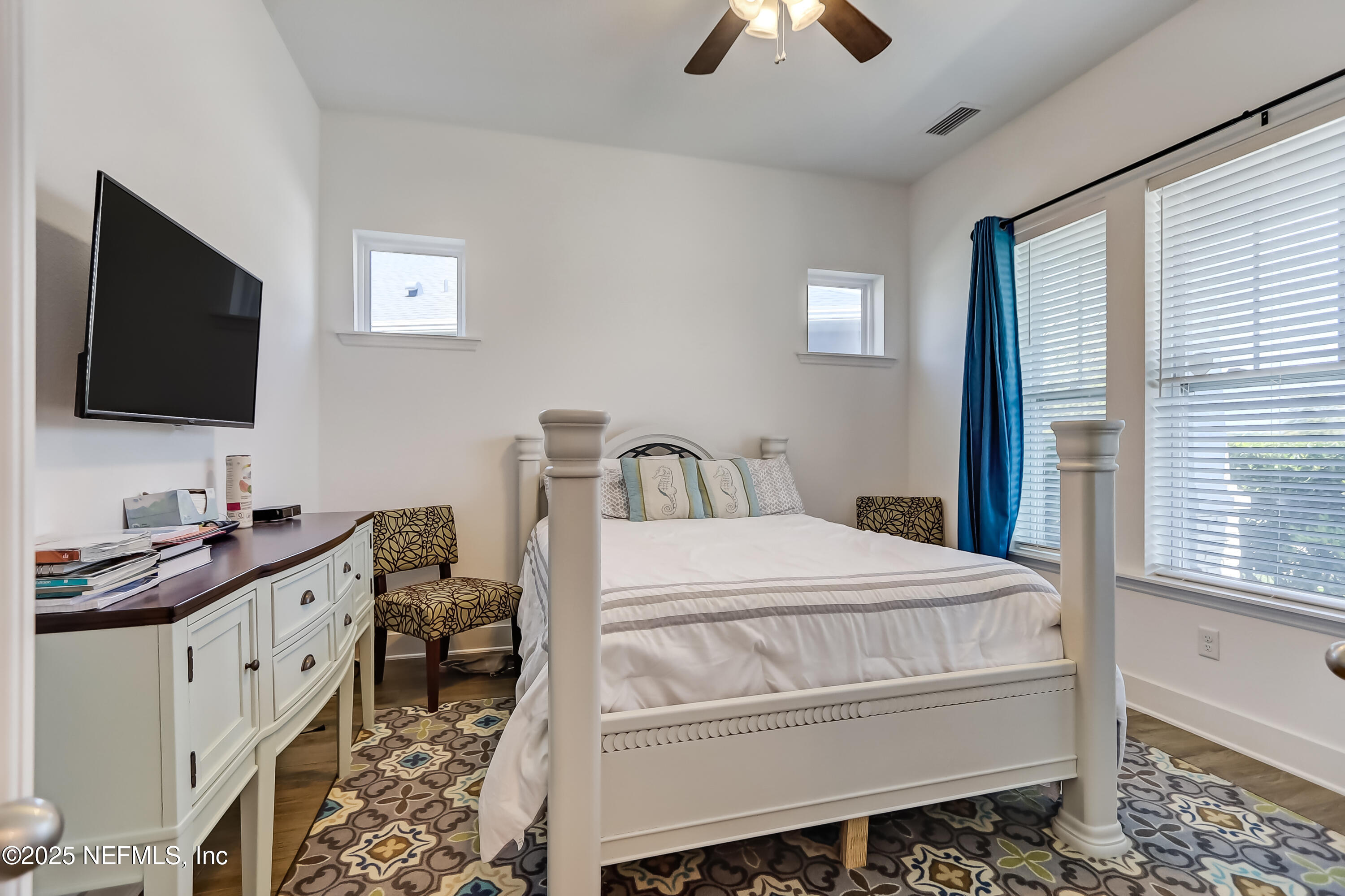 385 Daniel Park Circle Ponte Vedra, FL 32081 - Photo 7 of 34 a bedroom with a bed and a flat screen tv