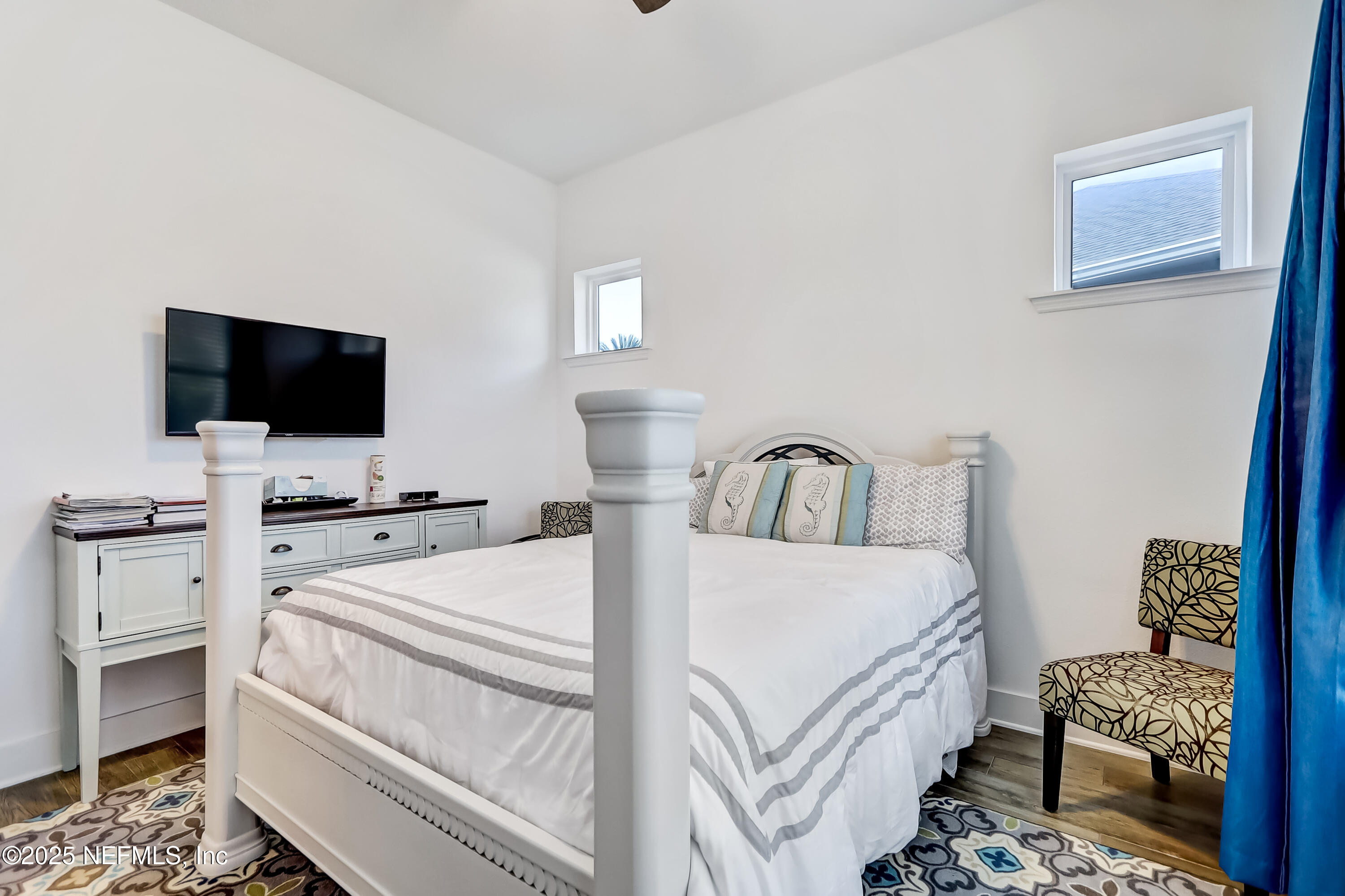 385 Daniel Park Circle Ponte Vedra, FL 32081 - Photo 8 of 34 a bedroom with a bed and a flat screen tv