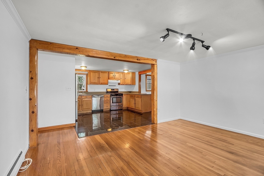 36 Mill Street Maynard, MA 01754 - Photo 16 of 42 a view of empty room with wooden floor