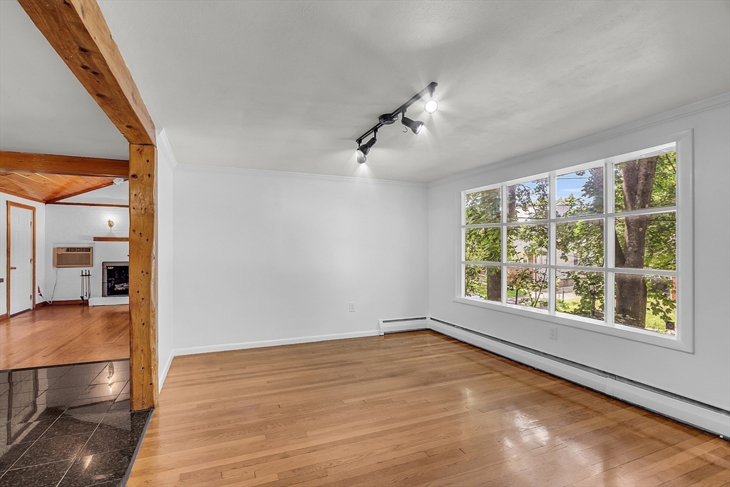 36 Mill Street Maynard, MA 01754 - Photo 17 of 42 a view of an empty room with a window