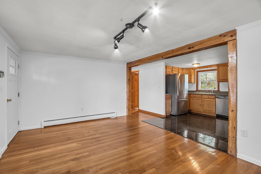 36 Mill Street Maynard, MA 01754 - Photo 19 of 42 a view of a refrigerator in kitchen and a sink