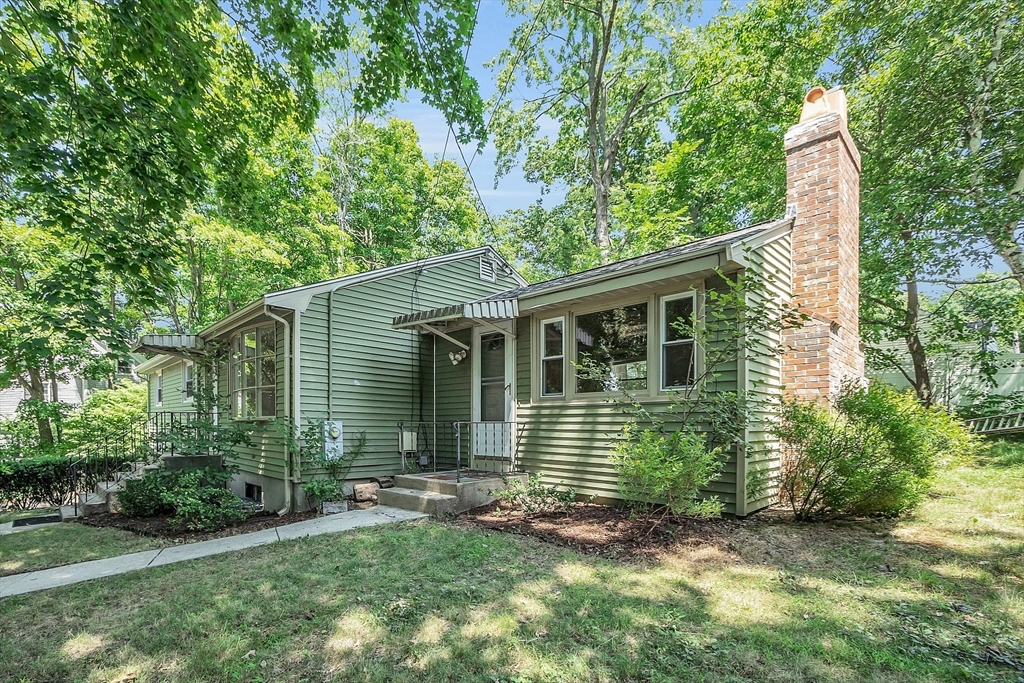 36 Mill Street Maynard, MA 01754 - Photo 2 of 42 a view of a house with a yard