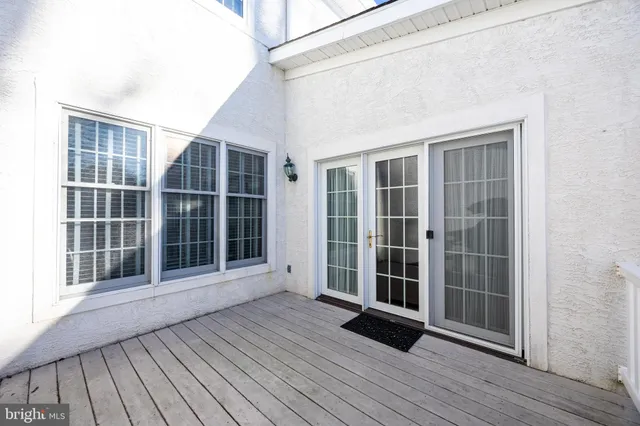 a view of front door with wooden floor