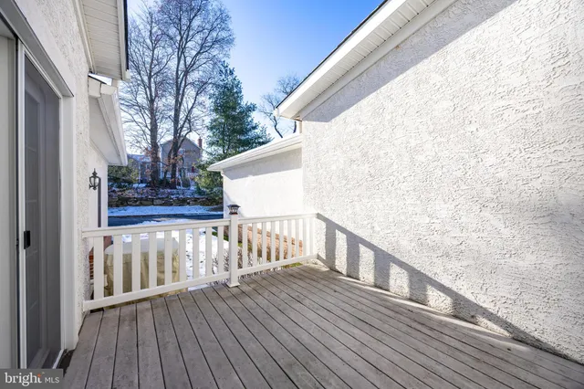 a view of wooden balcony with wooden floor