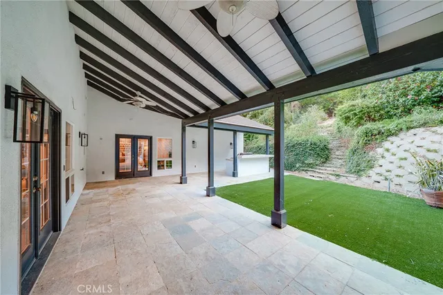 a view of a porch with a backyard
