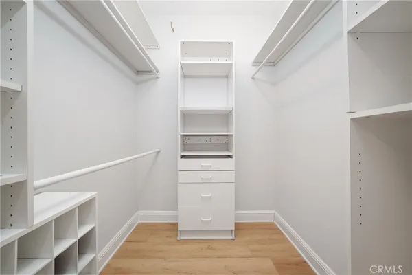 a view of an empty walk in closet