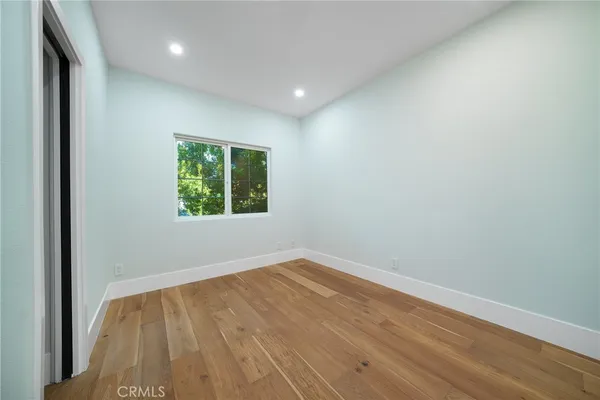 a front view of a house with garage