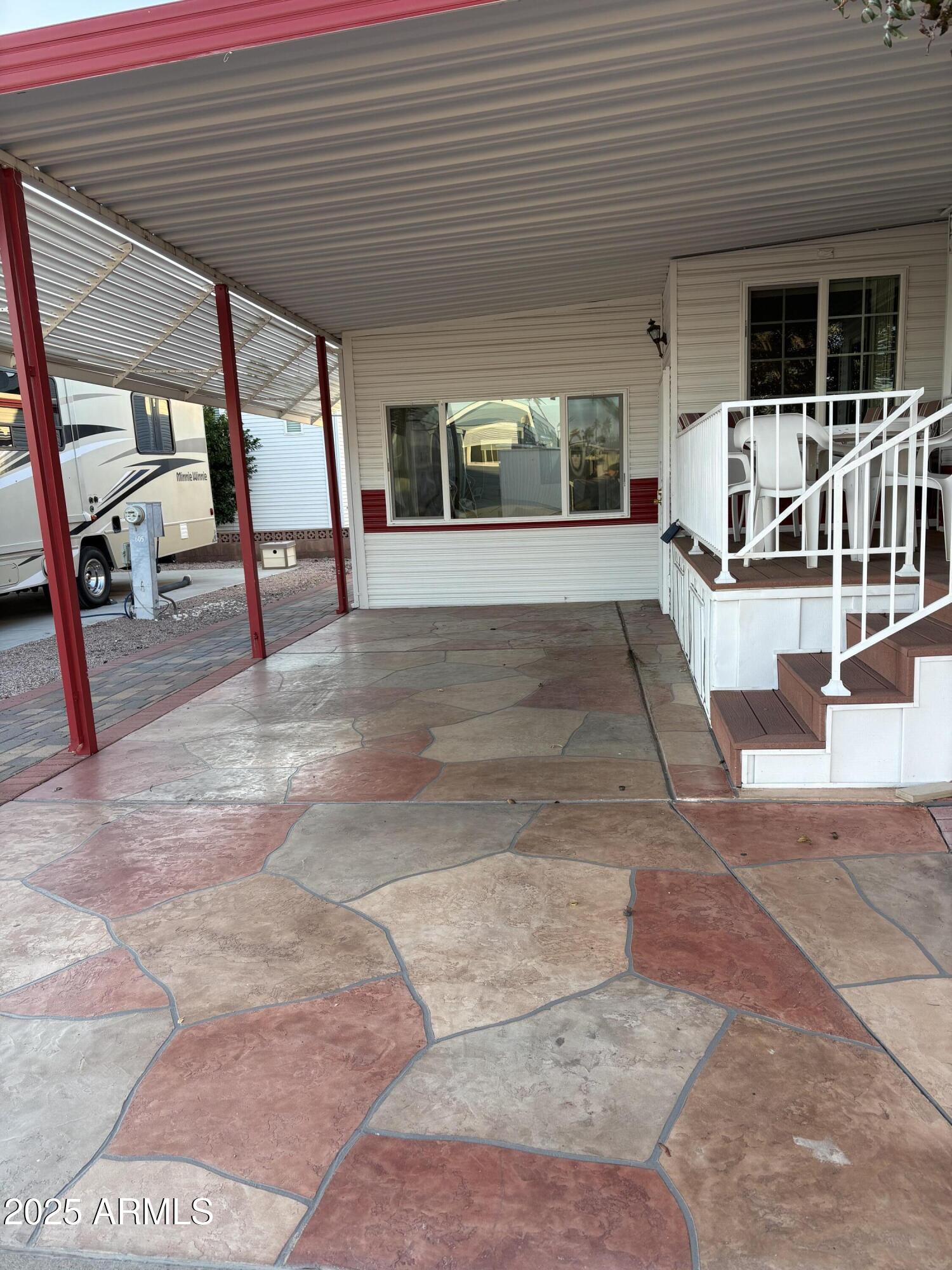 7750 East Broadway Road, Unit 604 Mesa, AZ 85208 - Photo 3 of 11 a view of house with outdoor space
