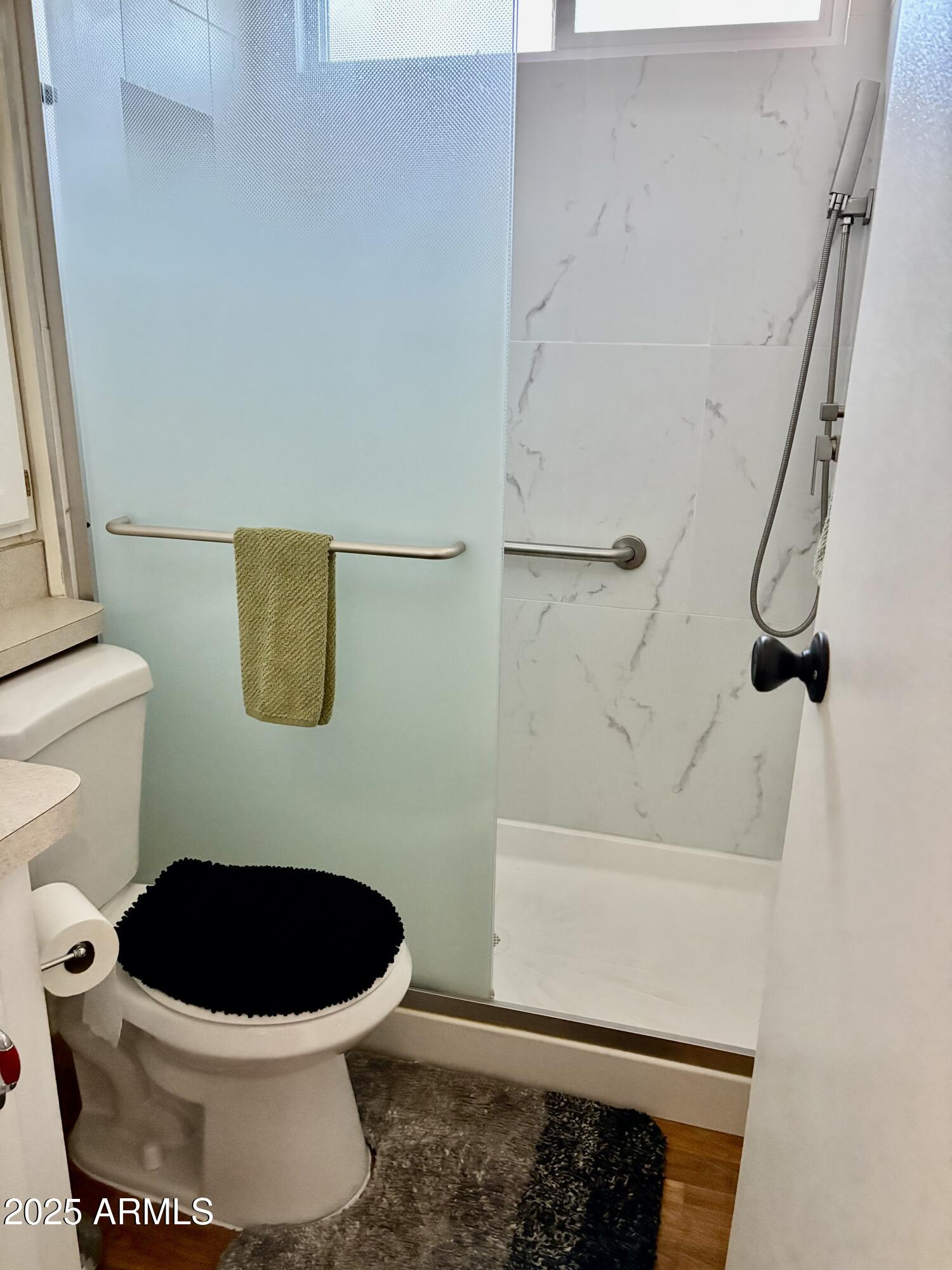 7750 East Broadway Road, Unit 604 Mesa, AZ 85208 - Photo 6 of 11 a toilet sitting next to a sink