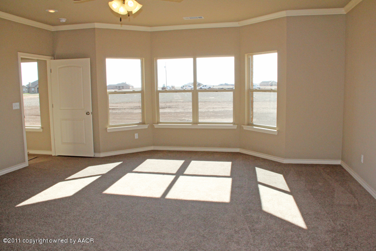 18451 Grasslands Road Bushland, TX 79124 - Photo 14 of 39 a view of an empty room with a window
