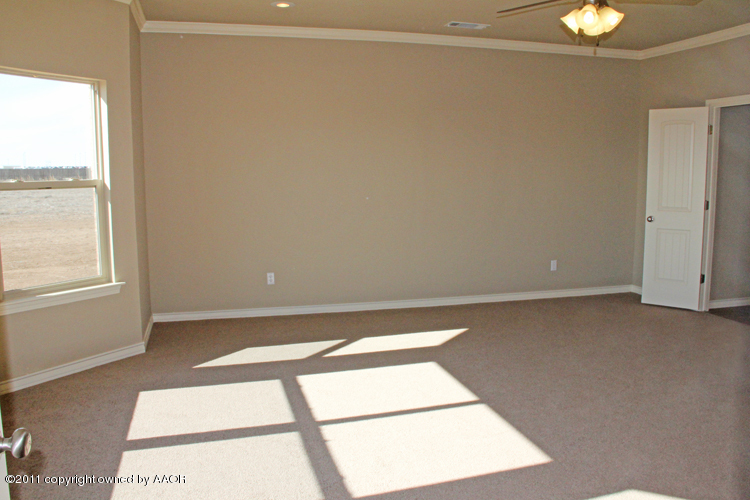 18451 Grasslands Road Bushland, TX 79124 - Photo 15 of 39 a view of an empty room with a window