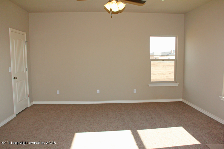 18451 Grasslands Road Bushland, TX 79124 - Photo 26 of 39 a view of an empty room with a window