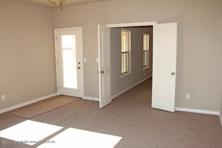 18451 Grasslands Road Bushland, TX 79124 - Photo 27 of 39 an empty room with windows