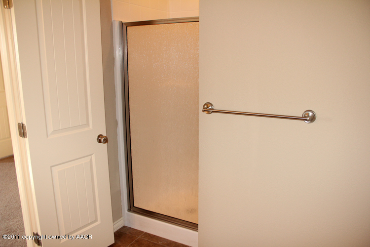 18451 Grasslands Road Bushland, TX 79124 - Photo 29 of 39 a bathroom with a shower