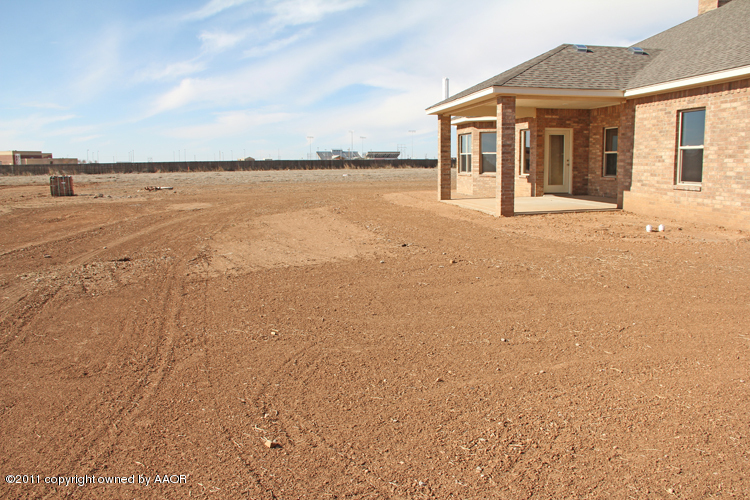 18451 Grasslands Road Bushland, TX 79124 - Photo 39 of 39 a front view of a house with ocean view