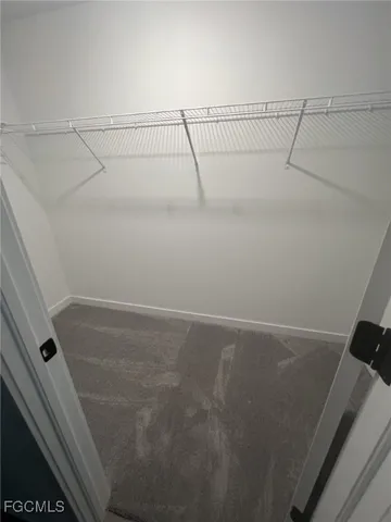 a view of small space with racks on the wall