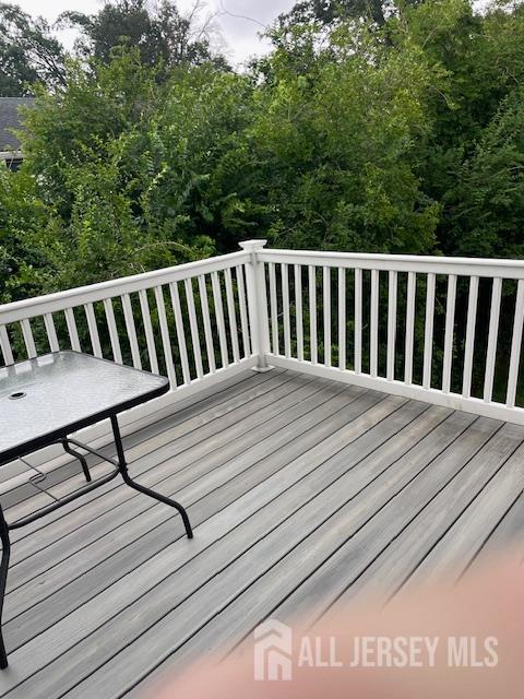 55 Murdock Street Fords, NJ 08863 - Photo 18 of 42 a balcony with wooden floor