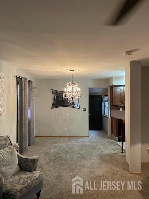 55 Murdock Street Fords, NJ 08863 - Photo 21 of 42 a living room with furniture and a chandelier