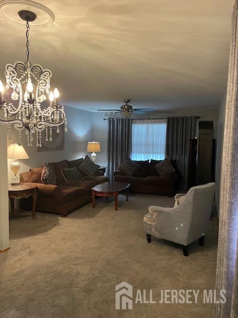55 Murdock Street Fords, NJ 08863 - Photo 22 of 42 a living room with furniture and a chandelier