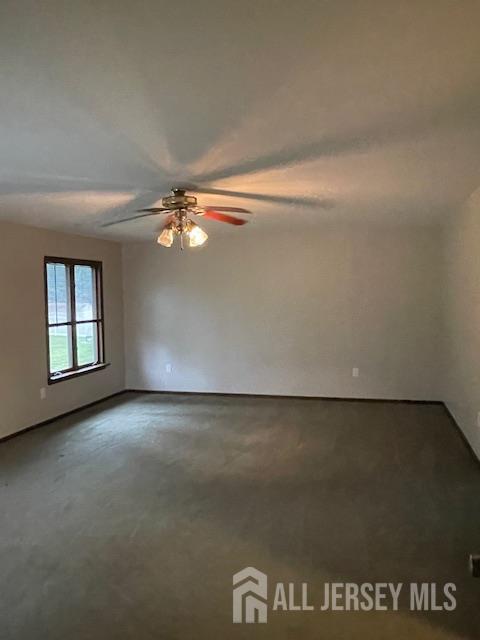 55 Murdock Street Fords, NJ 08863 - Photo 10 of 42 an empty room with a ceiling fan and window