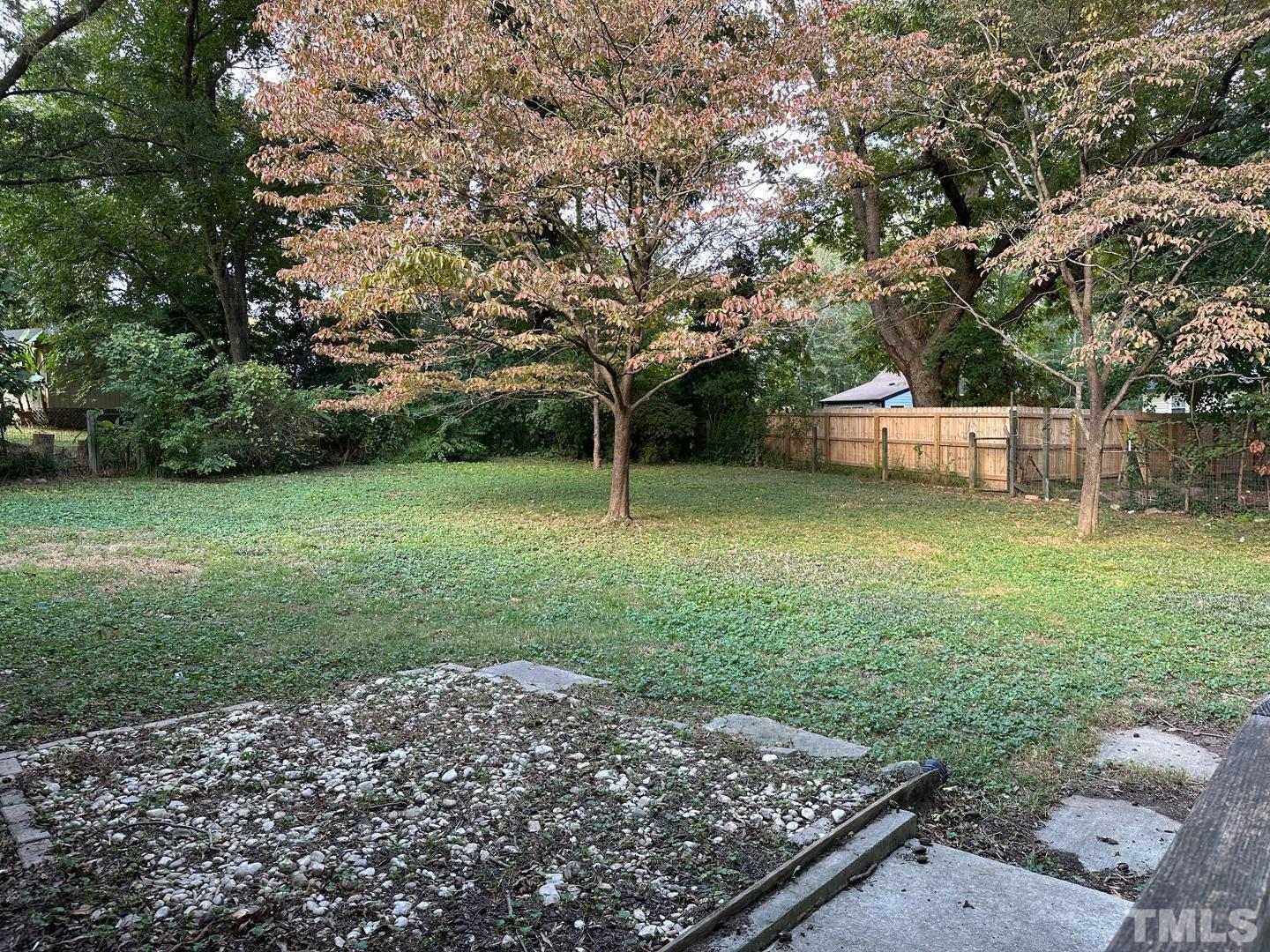 2617 Layden Street Raleigh, NC 27603 - Photo 9 of 9 a view of a backyard with large trees