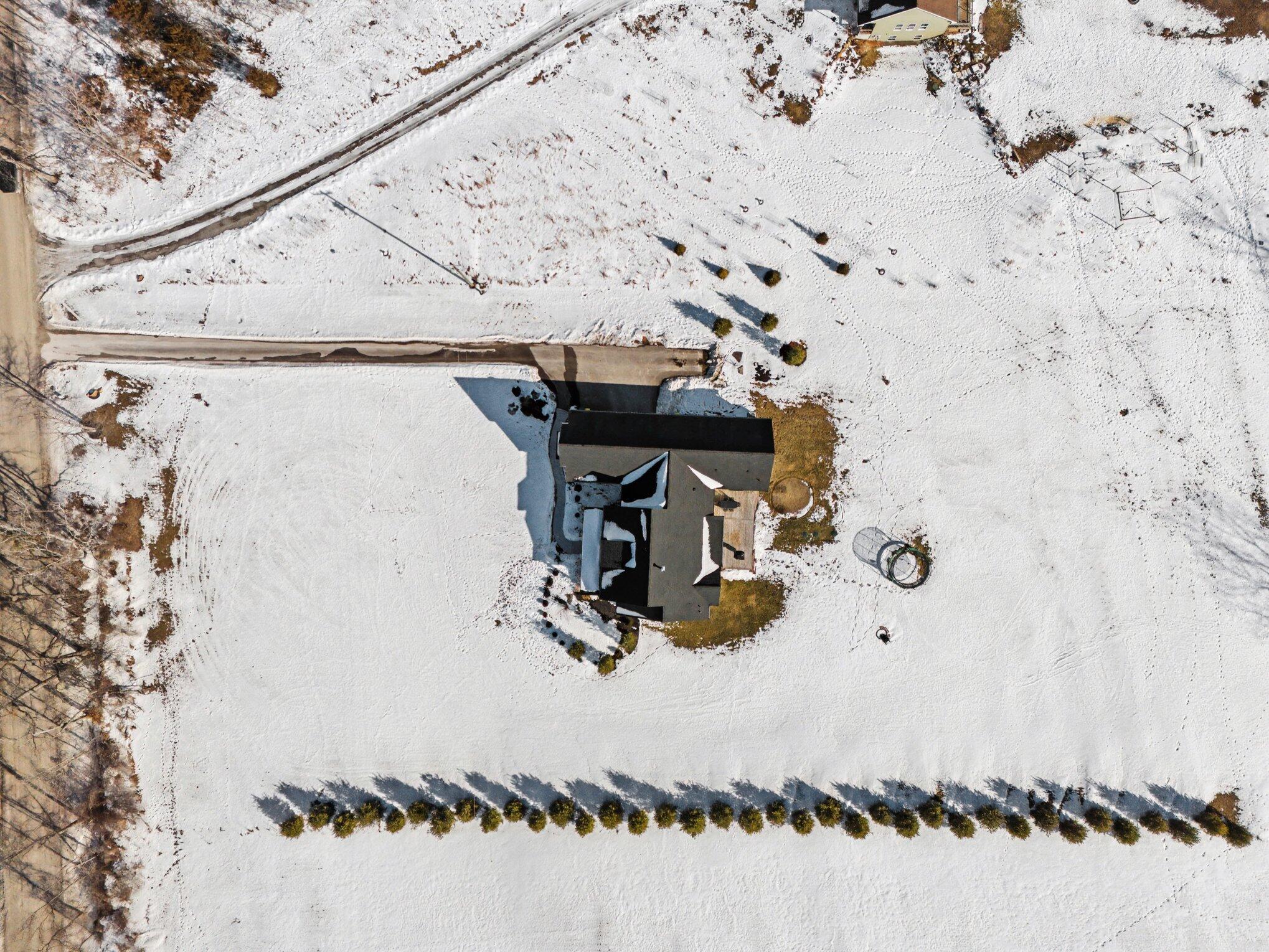 7433 Walsh Road Dexter, MI 48130 - Photo 47 of 48 004_dji_fly_20260213_150120_0038_1771017