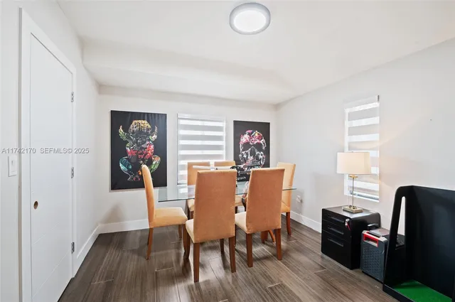 a bathroom with a sink a mirror and a shower