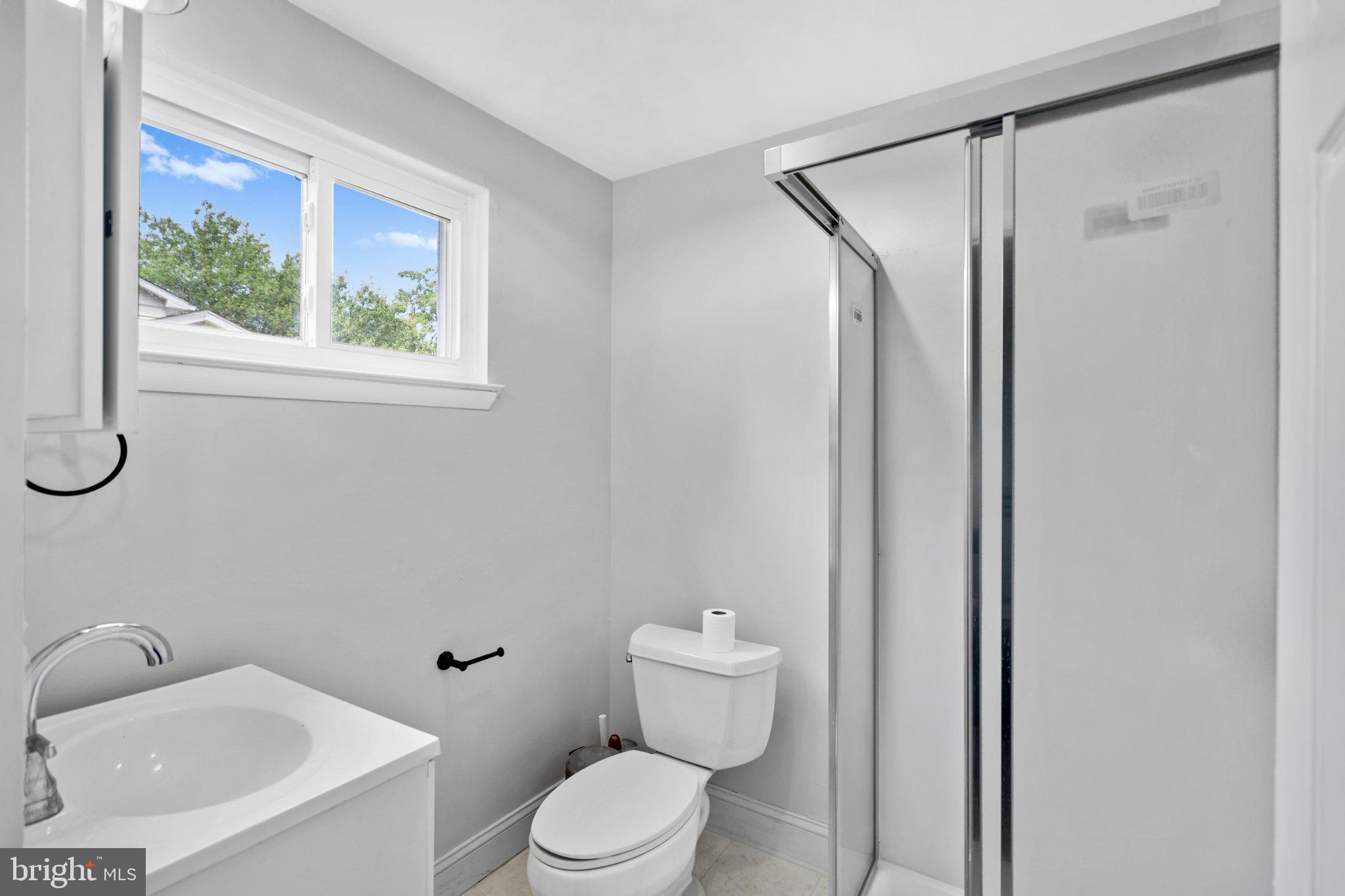 609 Foster Road Cheltenham, PA 19012 - Photo 16 of 44 Bright and airy modern bathroom retreat.