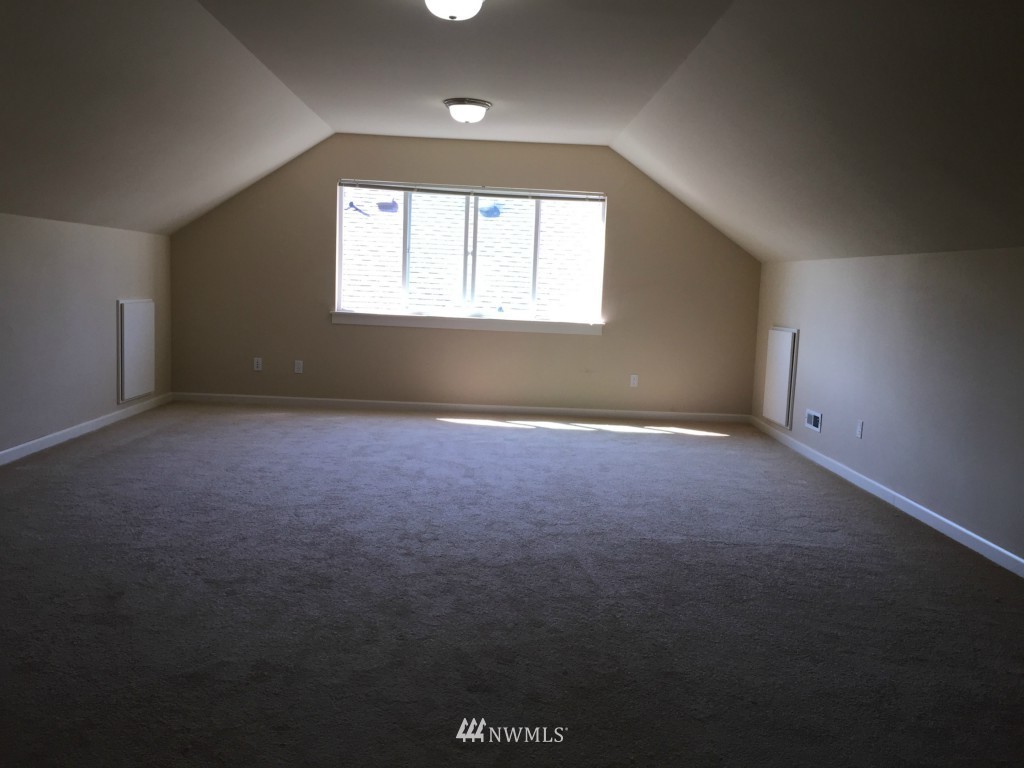 817 234th Place Southeast Bothell, WA 98021 - Photo 16 of 24 an empty room with a window