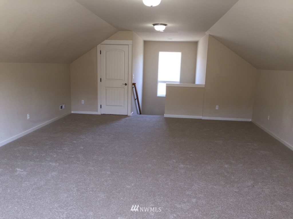 817 234th Place Southeast Bothell, WA 98021 - Photo 17 of 24 a view of an empty room with a window