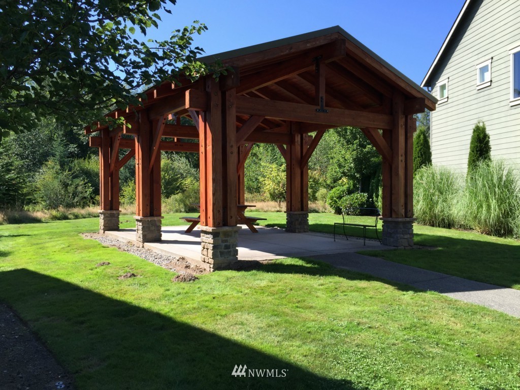 817 234th Place Southeast Bothell, WA 98021 - Photo 19 of 24 a view of a sitting area in front of a house