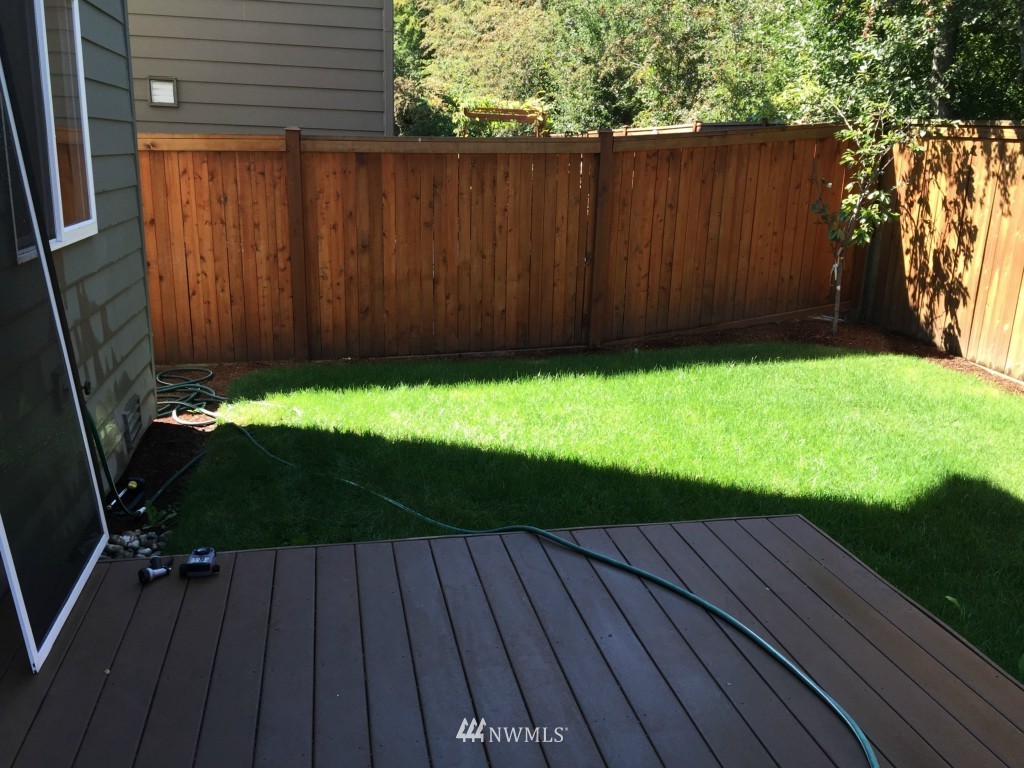 817 234th Place Southeast Bothell, WA 98021 - Photo 24 of 24 a view of outdoor space with wooden swing