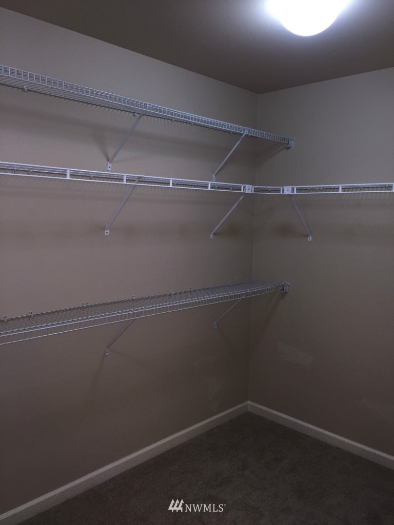 817 234th Place Southeast Bothell, WA 98021 - Photo 7 of 24 a view of an empty walk in closet