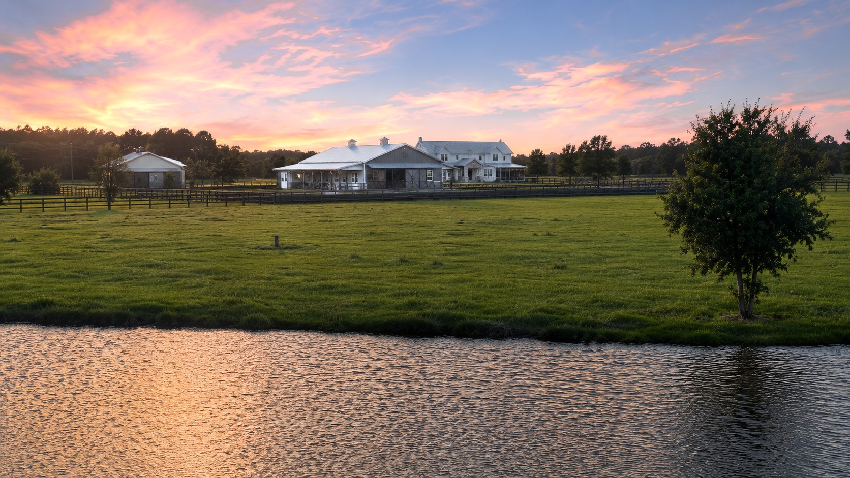 24118 Margerstadt Road Hockley, TX 77447 - Photo 2 of 46 As sunset settles across the pond, the landscape reflects the calm and openness that shape life at Paloma Ridge Farm. Designed as both a visual centerpiece and part of the property’s engineered water management system, the 23 foot deep powered pond supports drainage, irrigation, and the surrounding wildlife habitat.