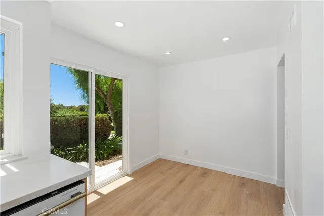 a view of a room with a large window