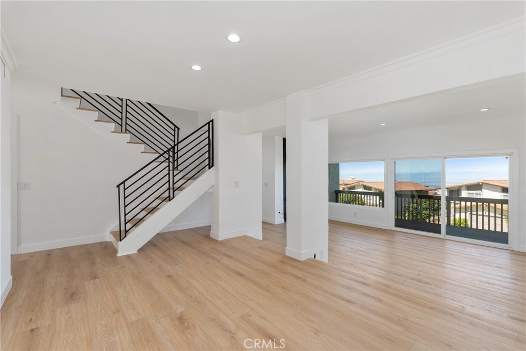 15 Hilltop Circle Rancho Palos Verdes, CA 90275 - Photo 20 of 40 a view of a hallway with wooden floor