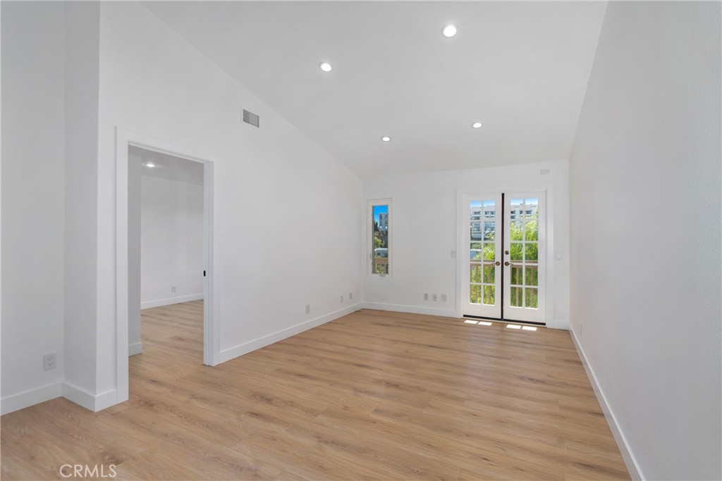 15 Hilltop Circle Rancho Palos Verdes, CA 90275 - Photo 25 of 40 wooden floor in an empty room with a window