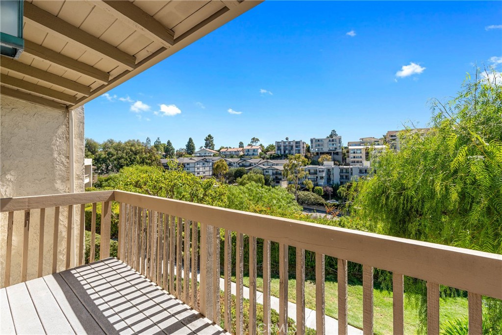 15 Hilltop Circle Rancho Palos Verdes, CA 90275 - Photo 27 of 40 a balcony with wooden floor and fence